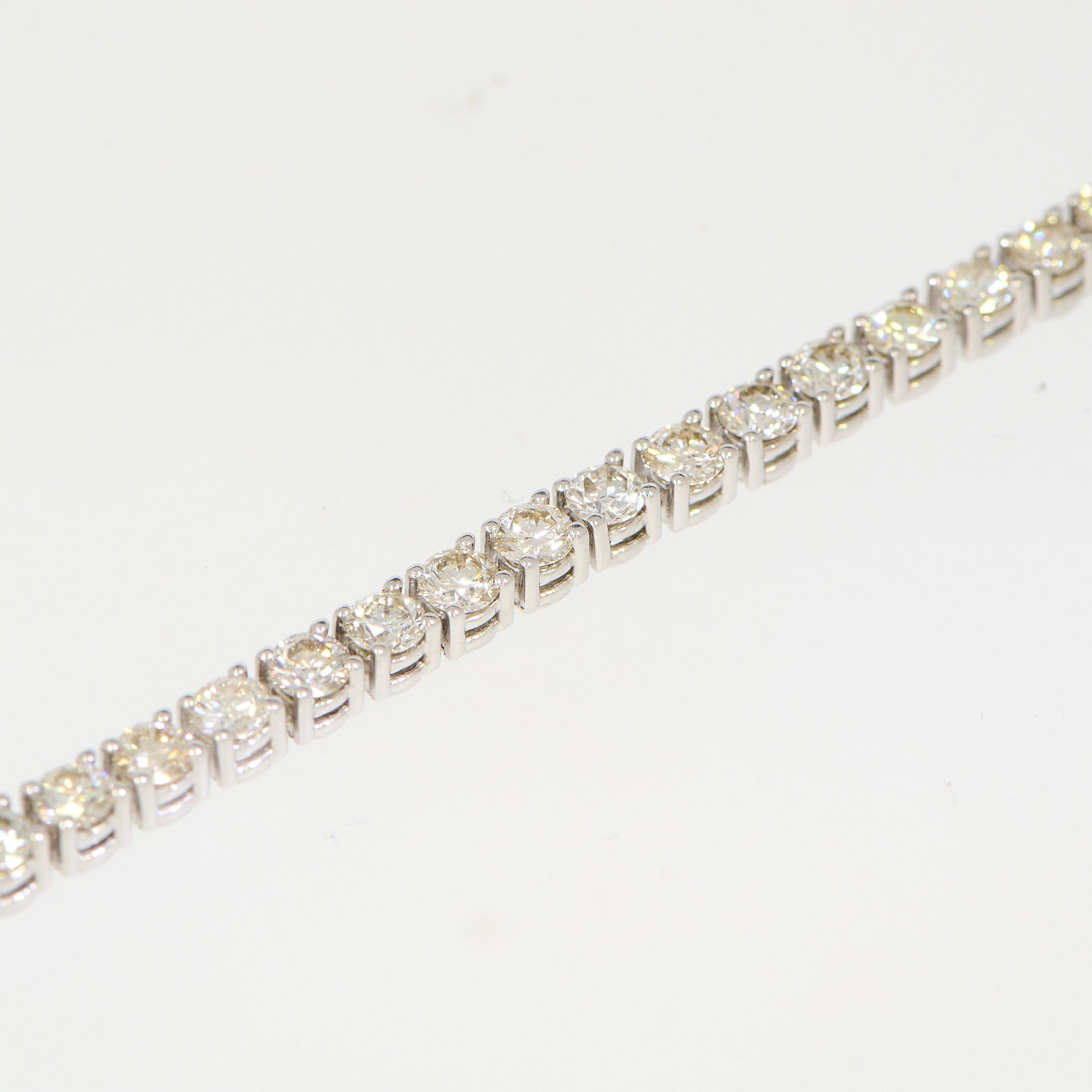Tennisarmbånd 18kt ca. 7,00ct h-vs/si