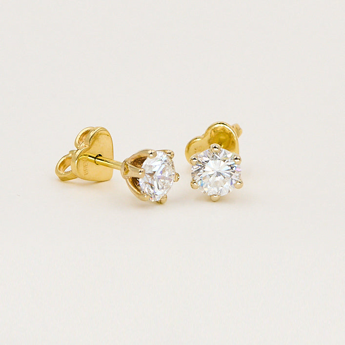Ørestikker i 18 kt. guld med 0,71 ct. E.VS2 og 0,70 ct. VS2 brillant – Inkl. GIA-certifikat