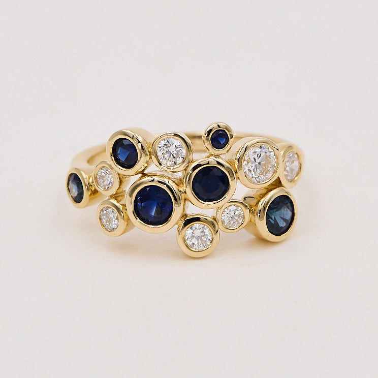 Ring i 14 kt. guld 0,55 ct. TW-SI  0,97 ct. safir