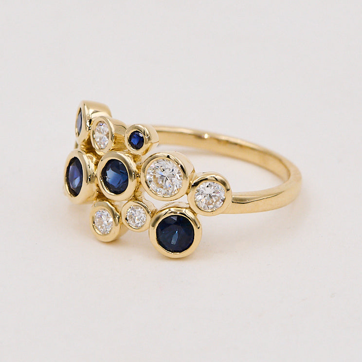 Ring i 14 kt. guld 0,55 ct. TW-SI  0,97 ct. safir