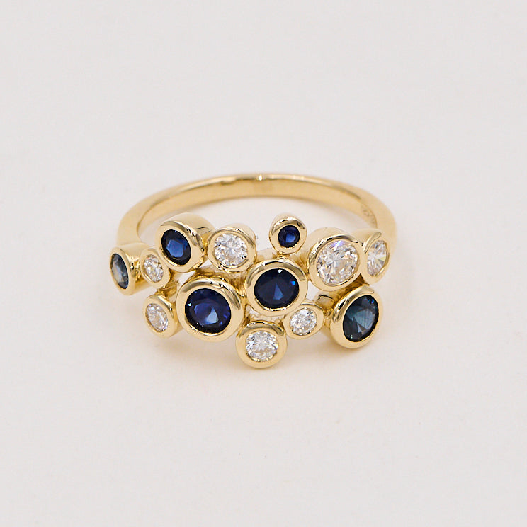 Ring i 14 kt. guld 0,55 ct. TW-SI  0,97 ct. safir